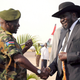 South Sudan's president Salva Kiir is received by chief of general staff of the Sudan People's Liberation Army, Paul Malong Awan at the airport in Juba, March 2015.